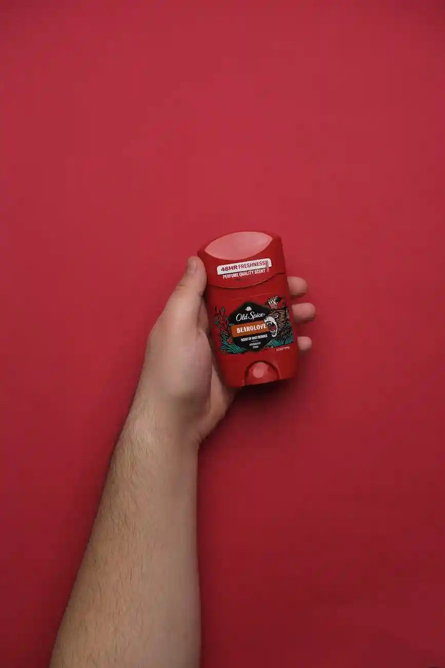 <a href="https://www.pexels.com/photo/hand-holding-deodorant-on-red-background-30353207/">Photo by Cemrecan Yurtman on Pexels</a>