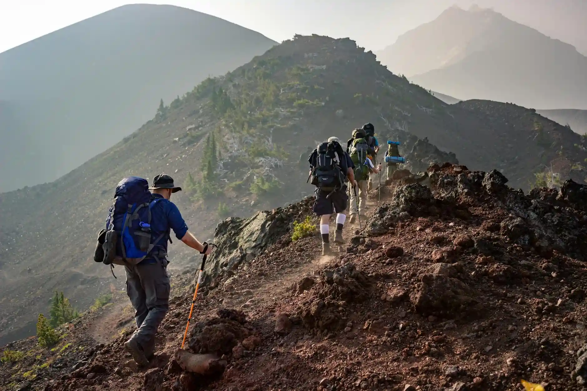 <a href="https://www.pexels.com/photo/group-of-person-walking-in-mountain-1365425/">Photo by Eric Sanman on Pexels</a>