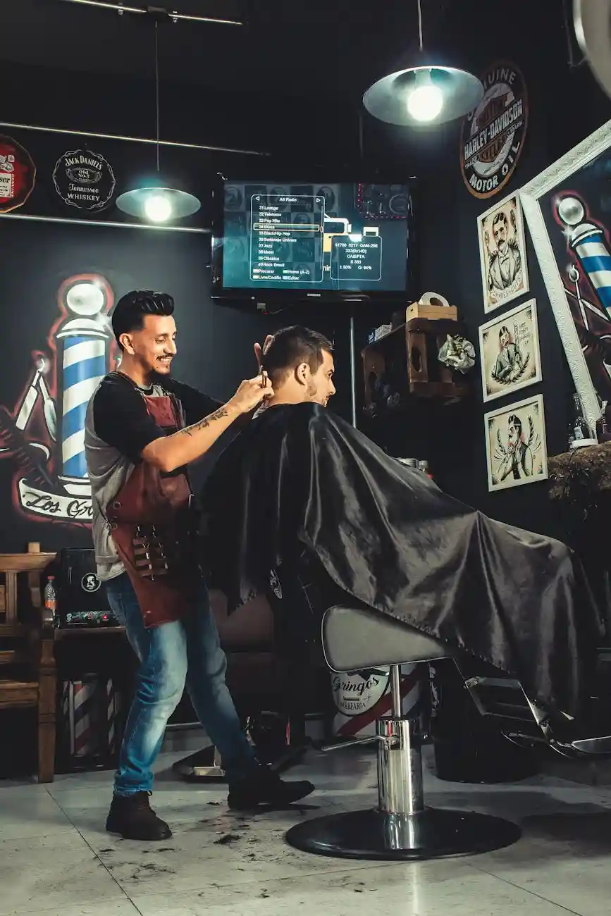 <a href="https://www.pexels.com/photo/smiling-man-cutting-another-mans-hair-inside-shop-2061820/">Photo by Thgusstavo Santana on Pexels</a>